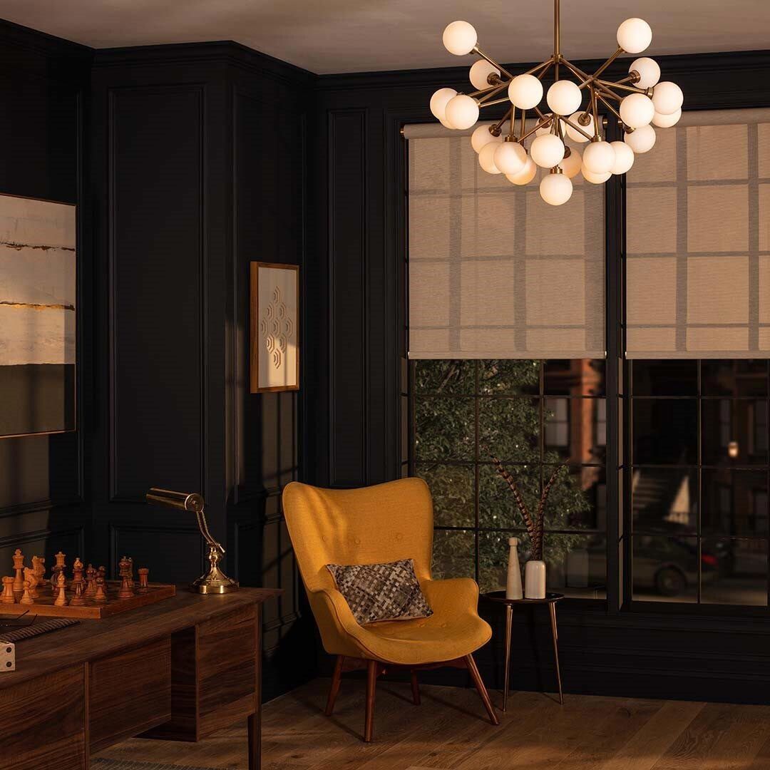 Elegant dining room with layered architectural and decorative lighting and a keypad control